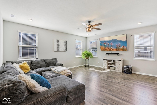 338 Limerick Ln, Pendleton, IN 46064 - living room featuring wood finished floors, a ceiling fan, plenty of natural light, and recessed lighting