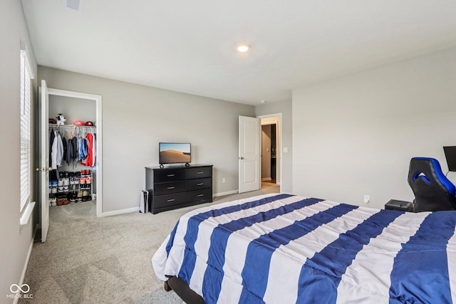 338 Limerick Ln, Pendleton, IN 46064 - bedroom featuring carpet flooring, a spacious closet, and multiple windows