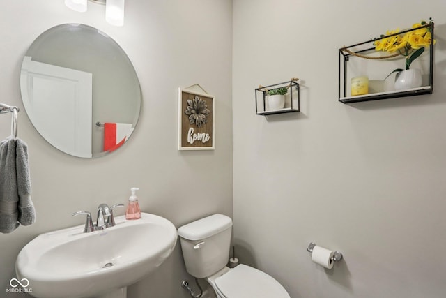 338 Limerick Ln, Pendleton, IN 46064 - half bathroom featuring a sink and toilet