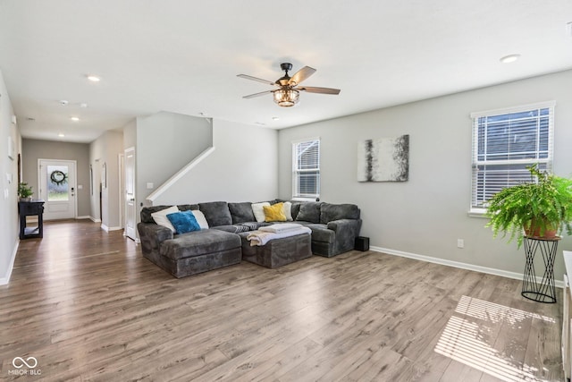 338 Limerick Ln, Pendleton, IN 46064 - living room with wood finished floors, ceiling fan, recessed lighting, and stairway