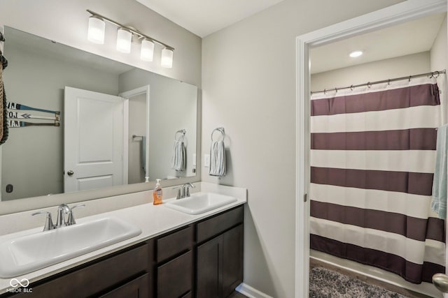 338 Limerick Ln, Pendleton, IN 46064 - full bathroom featuring double vanity and curtained shower