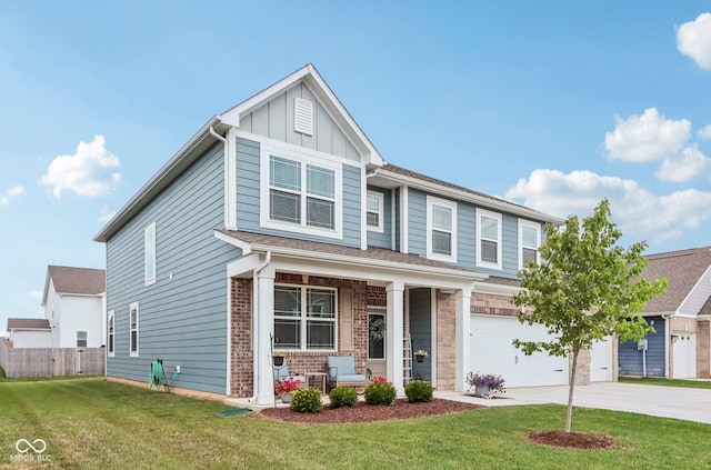338 Limerick Ln, Pendleton, IN 46064 - craftsman house featuring board and batten siding, concrete driveway, a garage, and covered porch