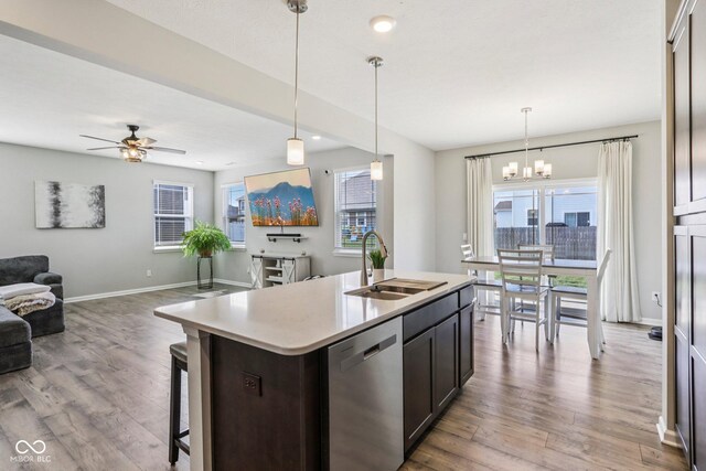 338 Limerick Ln, Pendleton, IN 46064 - kitchen featuring stainless steel dishwasher, wood finished floors, open floor plan, ceiling fan, and recessed lighting