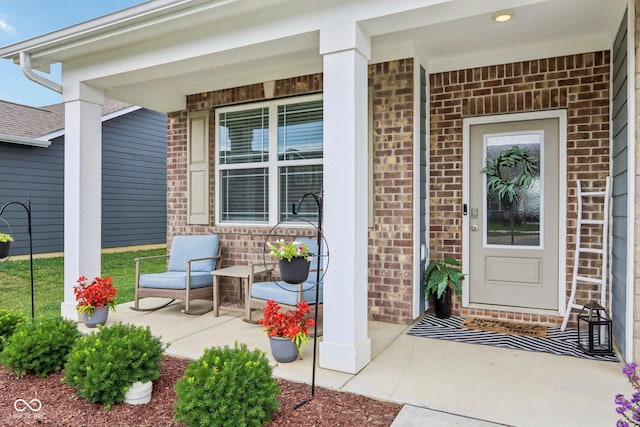 338 Limerick Ln, Pendleton, IN 46064 - entrance to property with a porch and brick siding