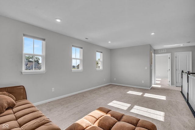 19174 Foley Dr, Westfield, IN 46074 - unfurnished living room featuring light colored carpet and recessed lighting