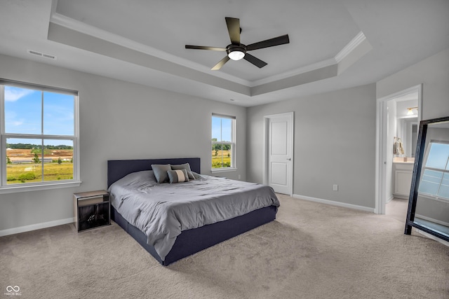 19174 Foley Dr, Westfield, IN 46074 - carpeted bedroom with a tray ceiling, crown molding, a ceiling fan, and ensuite bathroom
