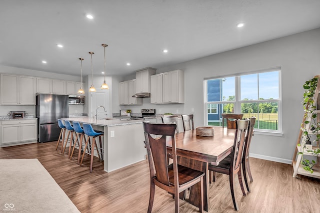 19174 Foley Dr, Westfield, IN 46074 - dining room featuring light wood-style flooring and recessed lighting