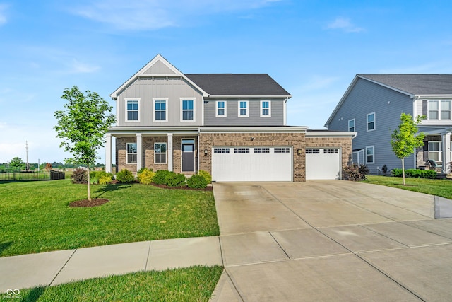19174 Foley Dr, Westfield, IN 46074 - view of front of house with board and batten siding, concrete driveway, brick siding, an attached garage, and a garage