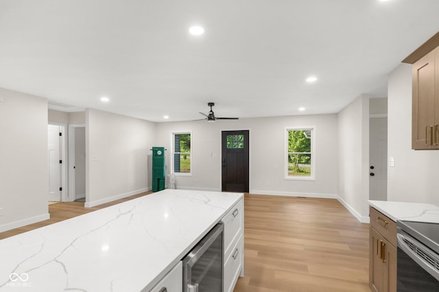 6530 W US Highway 50, North Vernon, IN 47265 - kitchen featuring wine cooler, light wood-style floors, recessed lighting, and healthy amount of natural light