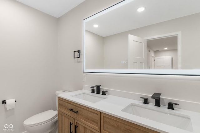 6530 W US Highway 50, North Vernon, IN 47265 - bathroom featuring double vanity and recessed lighting