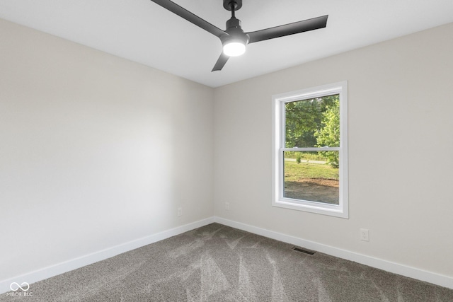 6530 W US Highway 50, North Vernon, IN 47265 - empty room featuring dark carpet and ceiling fan