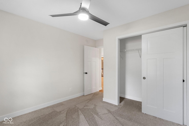 6530 W US Highway 50, North Vernon, IN 47265 - unfurnished bedroom featuring carpet floors, a closet, and a ceiling fan