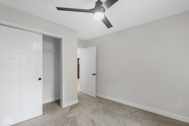 6530 W US Highway 50, North Vernon, IN 47265 - unfurnished bedroom featuring carpet floors, a closet, and a ceiling fan