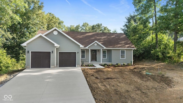 6530 W US Highway 50, North Vernon, IN 47265 - single story home with driveway, a garage, and roof with shingles