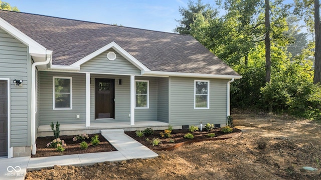 6530 W US Highway 50, North Vernon, IN 47265 - view of front of house with a porch, roof with shingles, and crawl space