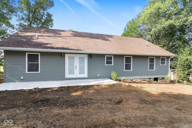 6530 W US Highway 50, North Vernon, IN 47265 - back of house with a patio area and roof with shingles
