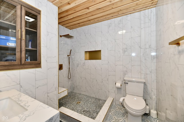 5202 Hill Valley Dr, Pittsboro, IN 46167 - bathroom featuring a marble finish shower, vanity, tile walls, and wood ceiling