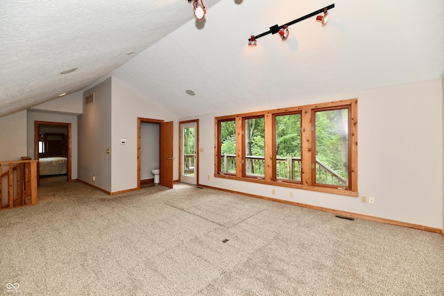 5202 Hill Valley Dr, Pittsboro, IN 46167 - unfurnished living room with lofted ceiling and carpet floors