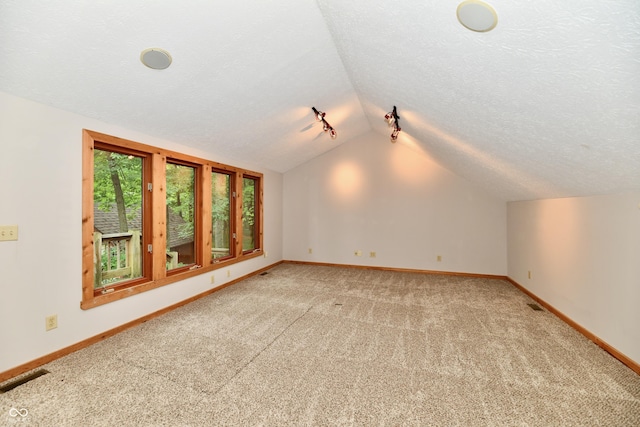 5202 Hill Valley Dr, Pittsboro, IN 46167 - bonus room featuring lofted ceiling and light carpet