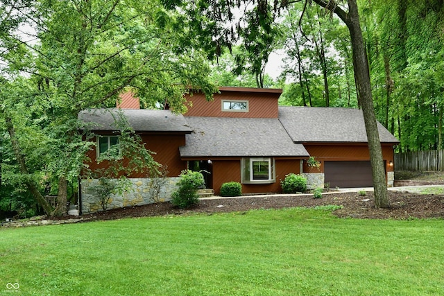 5202 Hill Valley Dr, Pittsboro, IN 46167 - view of front facade featuring stone siding, a shingled roof, and an attached garage