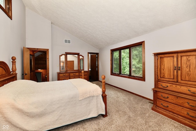 5202 Hill Valley Dr, Pittsboro, IN 46167 - bedroom with light carpet, a textured ceiling, and high vaulted ceiling