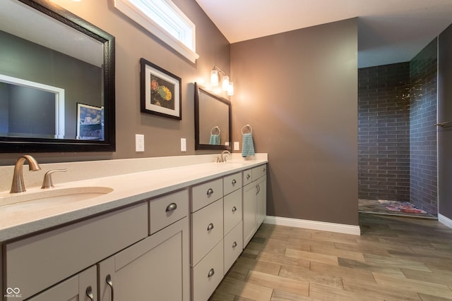 1434 Shootingstar Way, West Lafayette, IN 47906 - full bath featuring double vanity, wood finished floors, and tiled shower