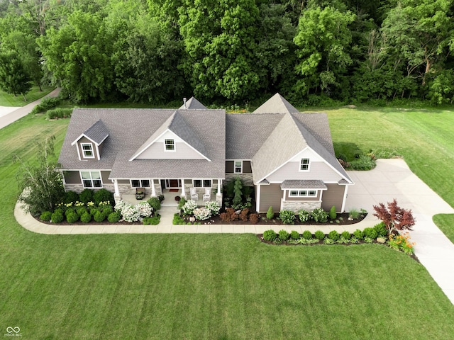 1434 Shootingstar Way, West Lafayette, IN 47906 - view of front of property with stone siding, covered porch, a front yard, and concrete driveway