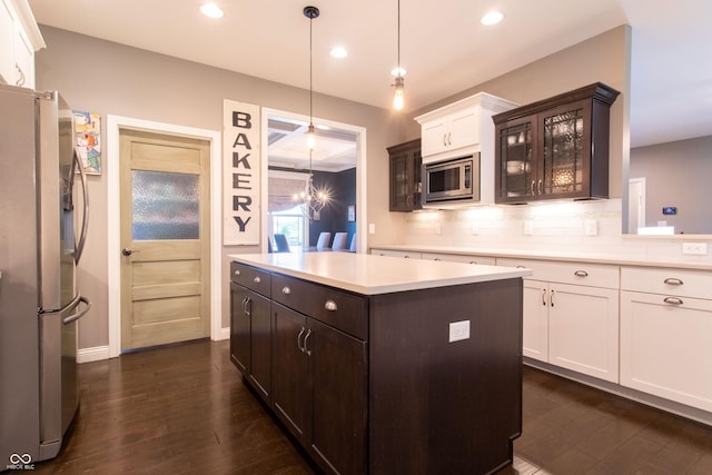 1434 Shootingstar Way, West Lafayette, IN 47906 - kitchen featuring stainless steel appliances, dark wood-type flooring, light countertops, glass insert cabinets, and dark brown cabinets