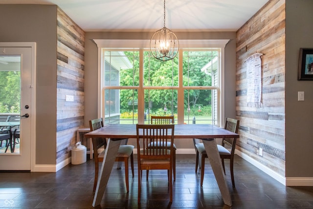 1434 Shootingstar Way, West Lafayette, IN 47906 - dining room featuring wood walls, a chandelier, and dark wood-style floors