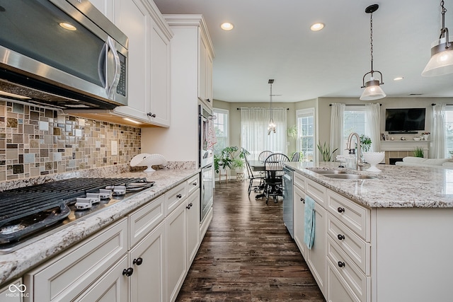 801 Oaklawn Dr, Westfield, IN 46074 - kitchen with stainless steel appliances, dark wood-style floors, healthy amount of natural light, white cabinetry, and recessed lighting