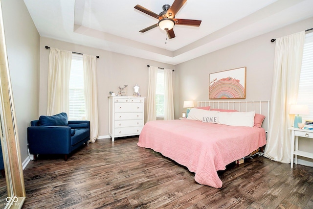 801 Oaklawn Dr, Westfield, IN 46074 - bedroom featuring a raised ceiling, dark wood finished floors, and ceiling fan