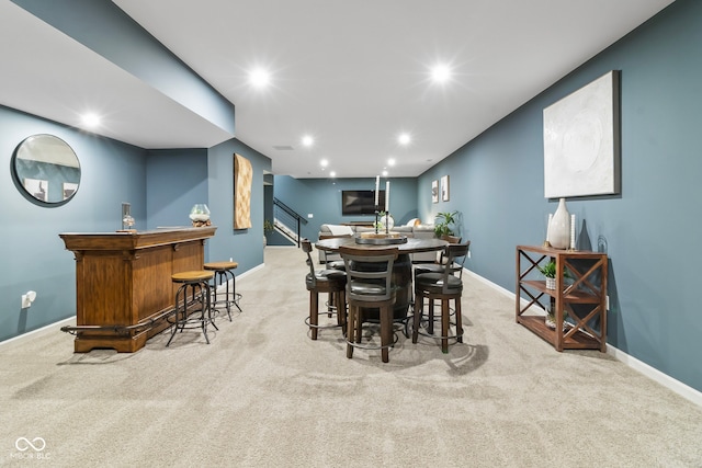 13644 Haven Cove Ln, Fishers, IN 46055 - dining space featuring a dry bar, carpet, and recessed lighting