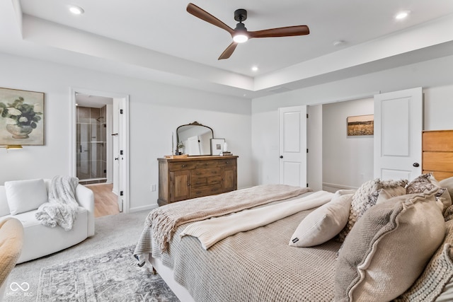 13644 Haven Cove Ln, Fishers, IN 46055 - bedroom with carpet floors, recessed lighting, a raised ceiling, a ceiling fan, and ensuite bath