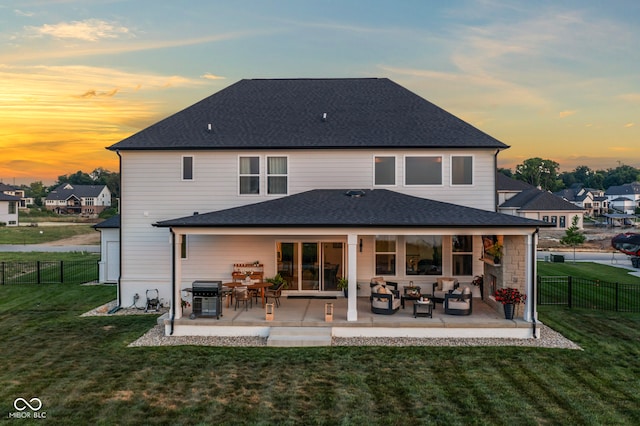 13644 Haven Cove Ln, Fishers, IN 46055 - back of house at dusk with a fenced backyard, a patio area, outdoor lounge area, and roof with shingles