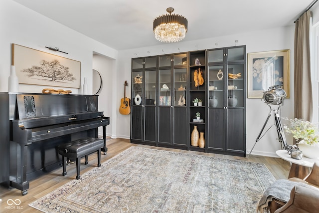 13644 Haven Cove Ln, Fishers, IN 46055 - living area with light wood-style floors and a chandelier