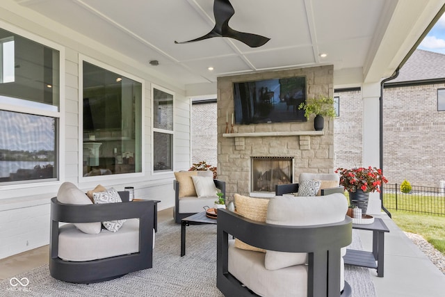 13644 Haven Cove Ln, Fishers, IN 46055 - view of patio / terrace with an outdoor living space with a fireplace and ceiling fan
