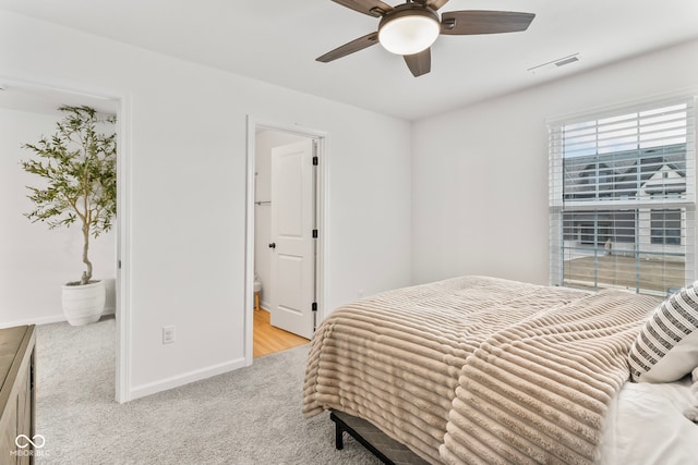 13644 Haven Cove Ln, Fishers, IN 46055 - carpeted bedroom featuring baseboards and ensuite bath