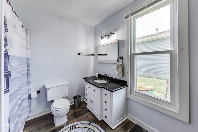 307 E Walnut St, Lebanon, IN 46052 - full bathroom featuring vanity and wood finished floors