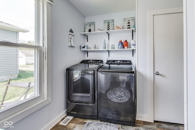307 E Walnut St, Lebanon, IN 46052 - laundry area featuring separate washer and dryer and wood finished floors