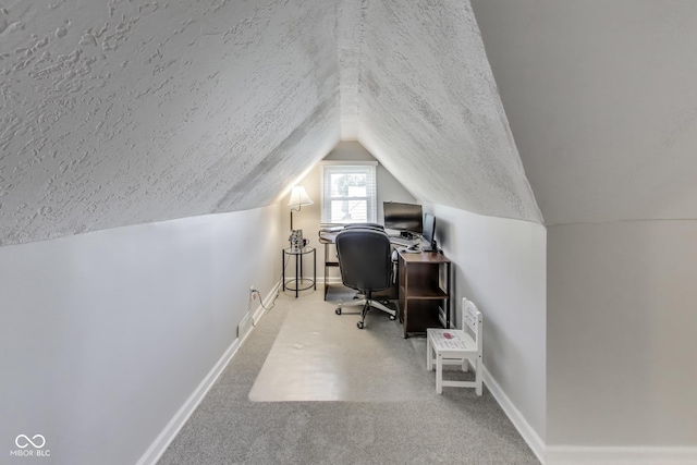 307 E Walnut St, Lebanon, IN 46052 - carpeted home office featuring a textured ceiling and lofted ceiling