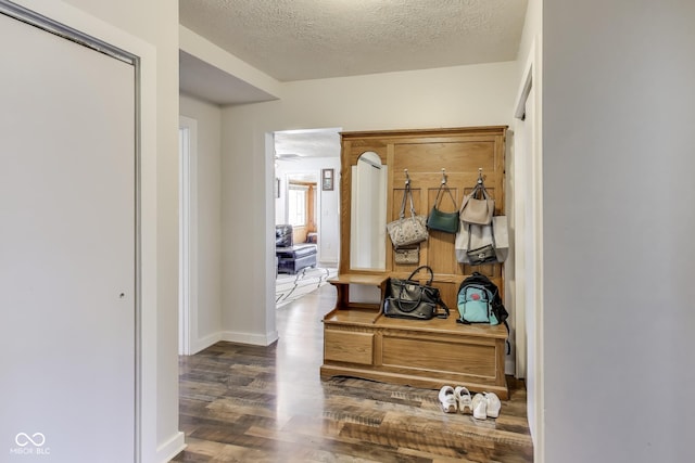 307 E Walnut St, Lebanon, IN 46052 - hallway with wood finished floors and a textured ceiling