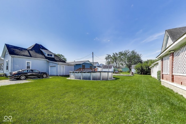 307 E Walnut St, Lebanon, IN 46052 - view of grassy yard featuring a covered pool