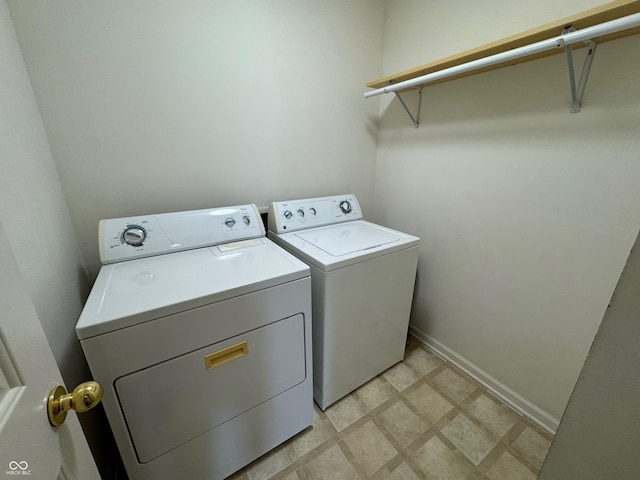 14520 Brackney Ln, Carmel, IN 46032 - laundry room with independent washer and dryer and light floors