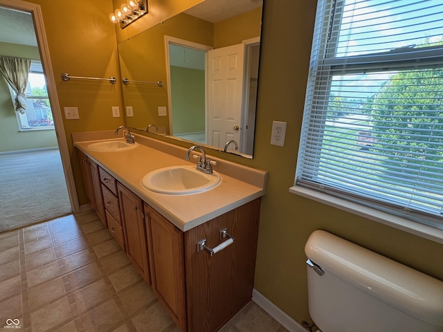 14520 Brackney Ln, Carmel, IN 46032 - bathroom with double vanity and toilet