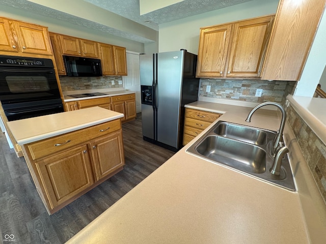14520 Brackney Ln, Carmel, IN 46032 - kitchen featuring black appliances, dark wood-style floors, decorative backsplash, and light countertops