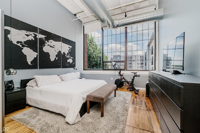 624 E Walnut St Unit 26, Indianapolis, IN 46204 - bedroom featuring hardwood / wood-style flooring