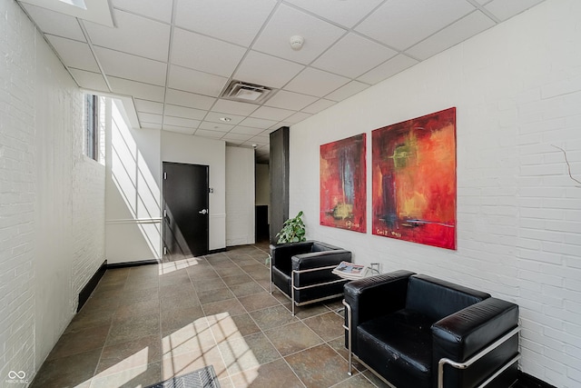 624 E Walnut St Unit 26, Indianapolis, IN 46204 - lobby with a drop ceiling and brick wall