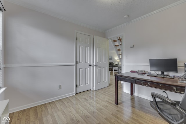 9676 Spruce Ln, Fishers, IN 46038 - home office featuring wood finished floors, crown molding, and a textured ceiling
