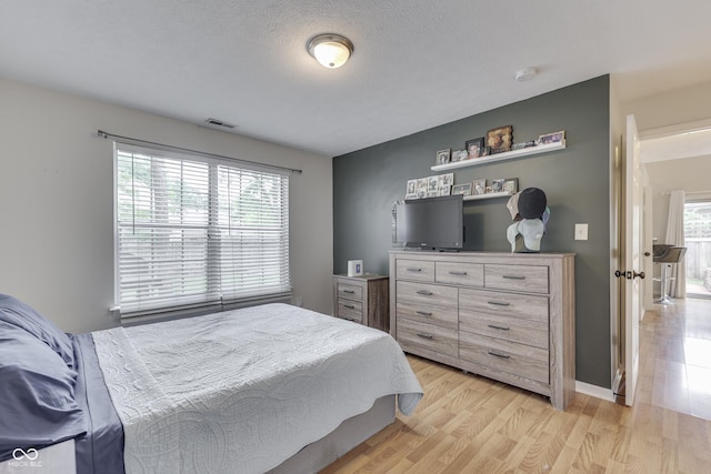 9676 Spruce Ln, Fishers, IN 46038 - bedroom with light wood-style flooring