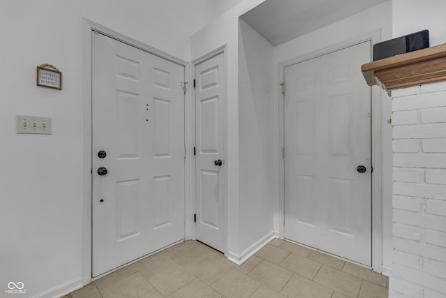 9676 Spruce Ln, Fishers, IN 46038 - foyer entrance with baseboards and light tile patterned floors